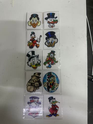 ADESIVO MINI CARTELA TIO PATINHAS 10 UND
